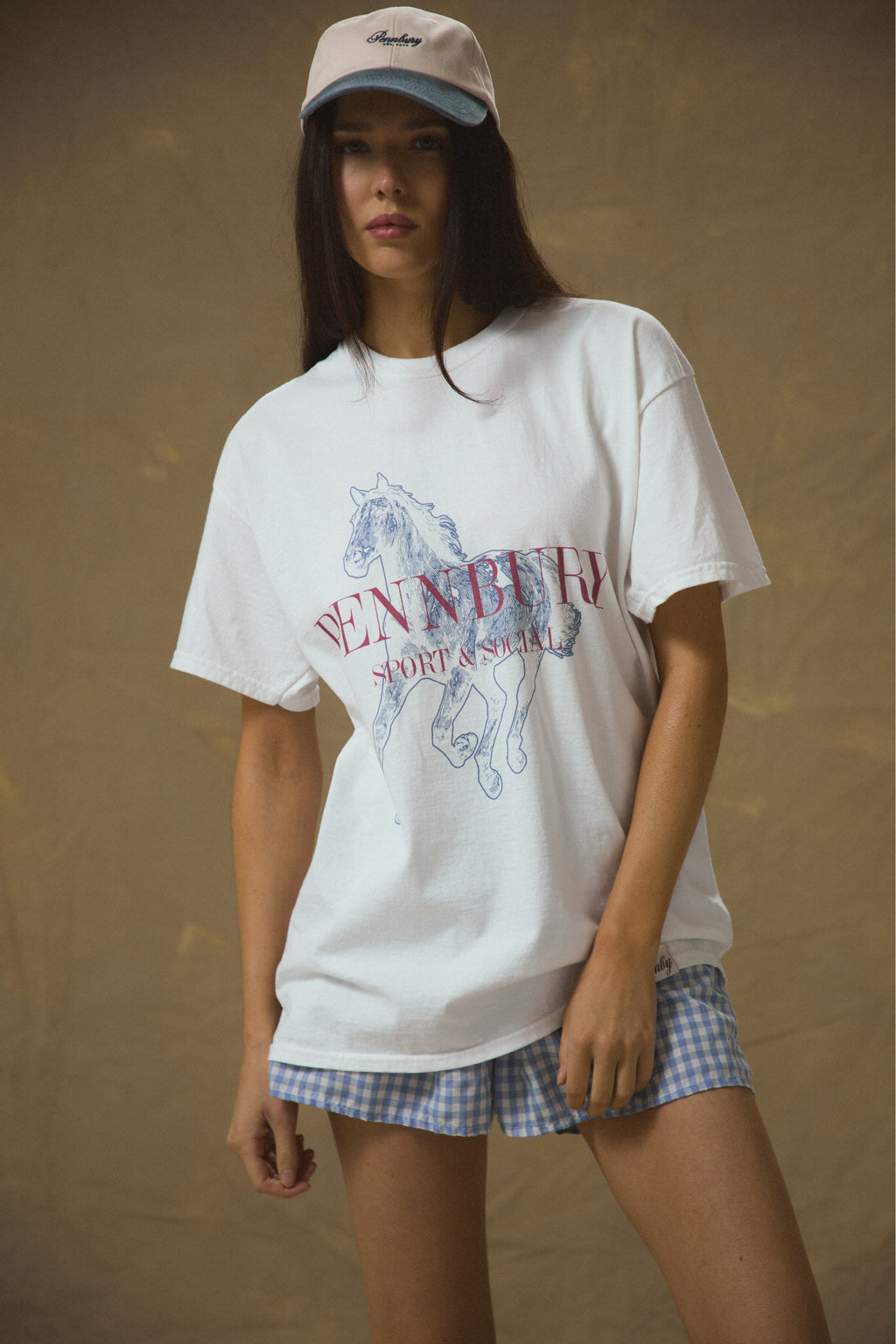 Model wearing Pennbury Dressage oversized graphic t-shirt