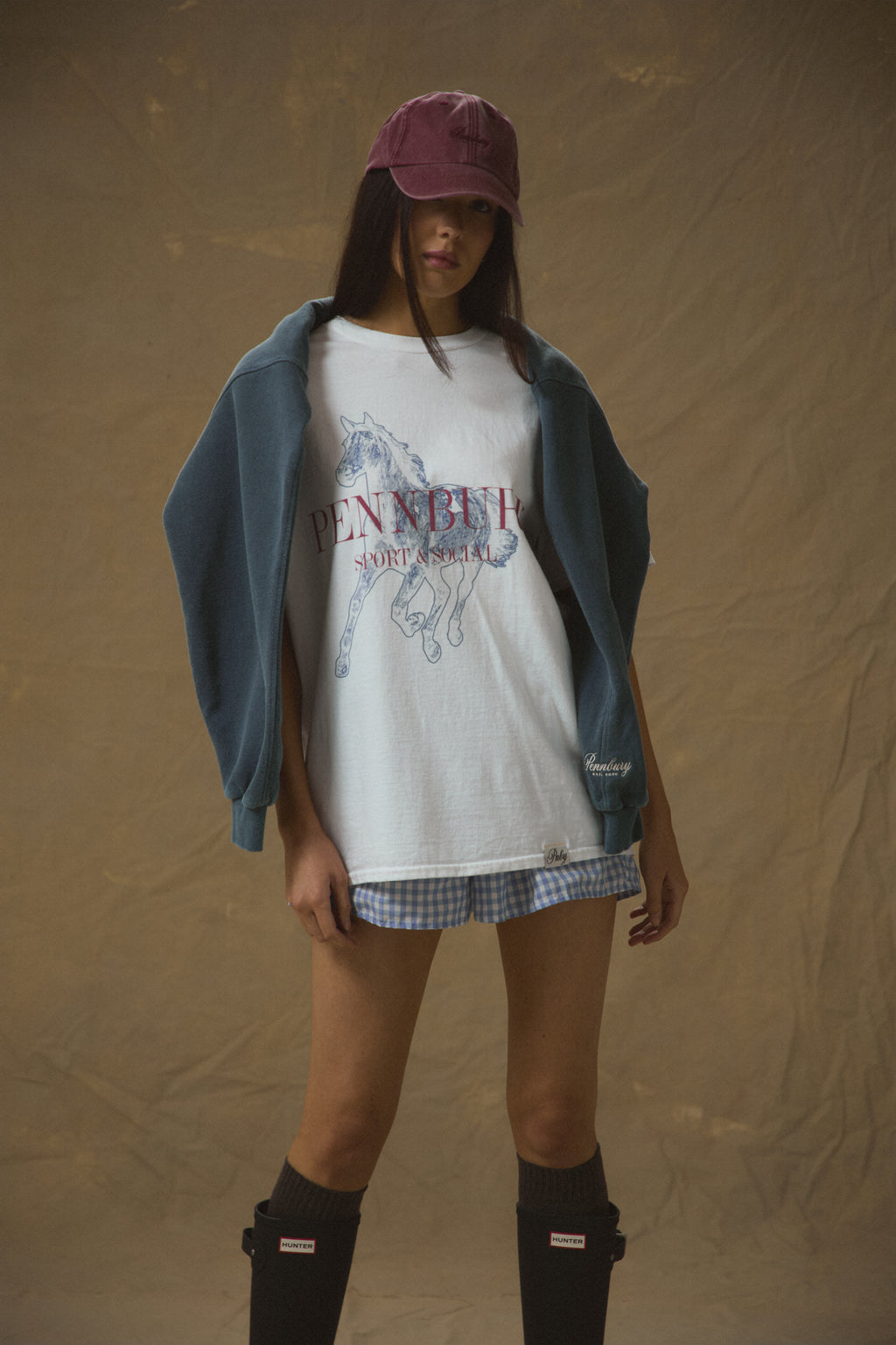 Model wearing Pennbury Dressage oversized graphic t-shirt