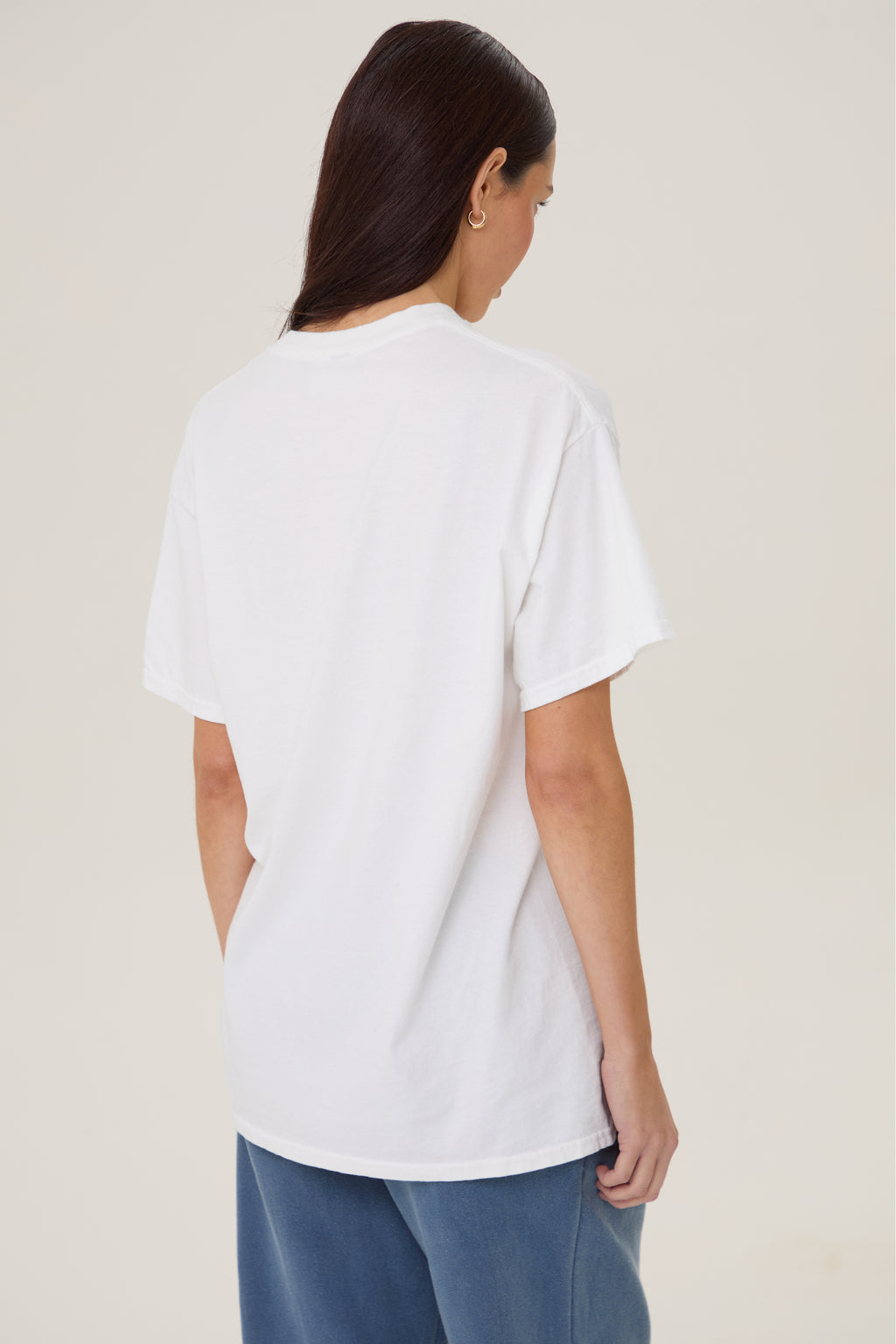 Model wearing Pennbury Dressage oversized graphic t-shirt