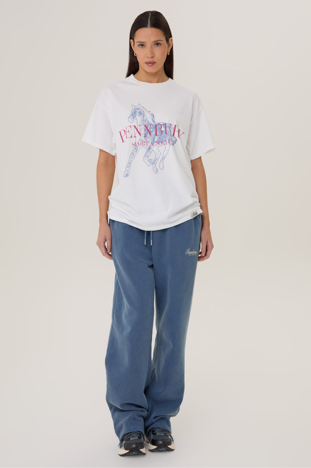 Model wearing Pennbury Dressage oversized graphic t-shirt