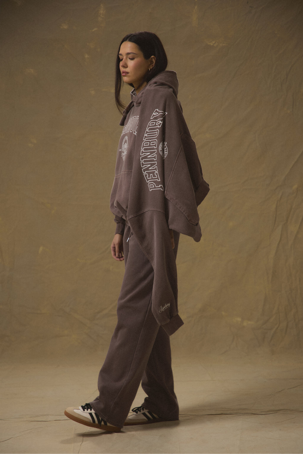 Model wearing Pennbury Grove oversized mocha hoodie with joggers