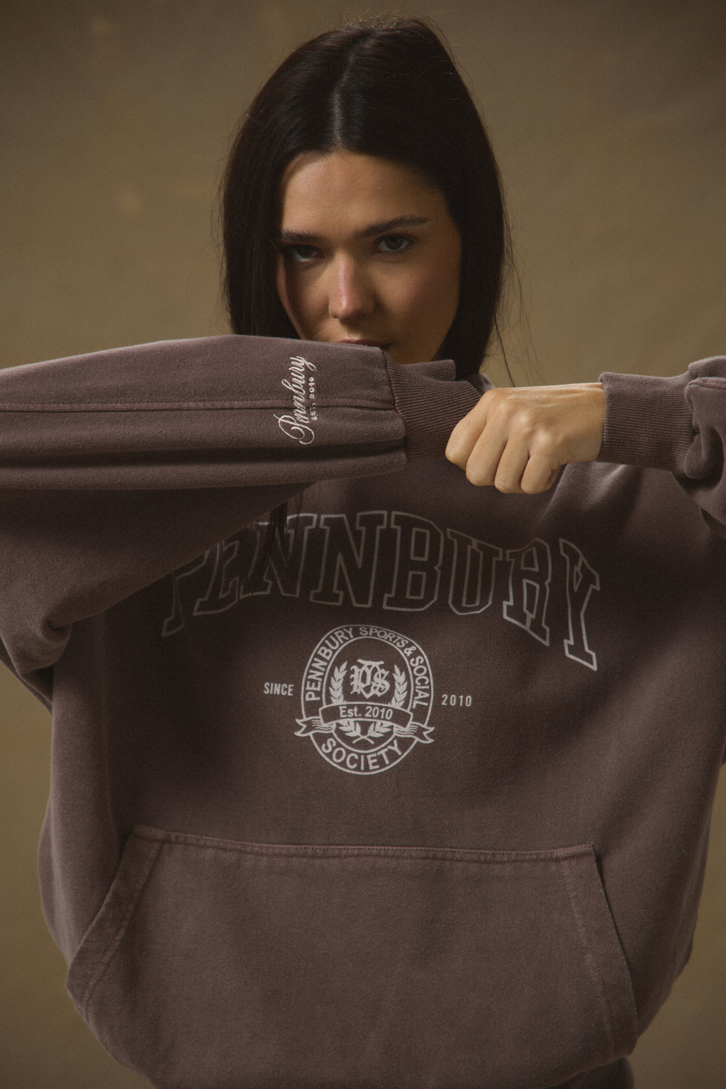 Model wearing Pennbury Grove oversized mocha hoodie 