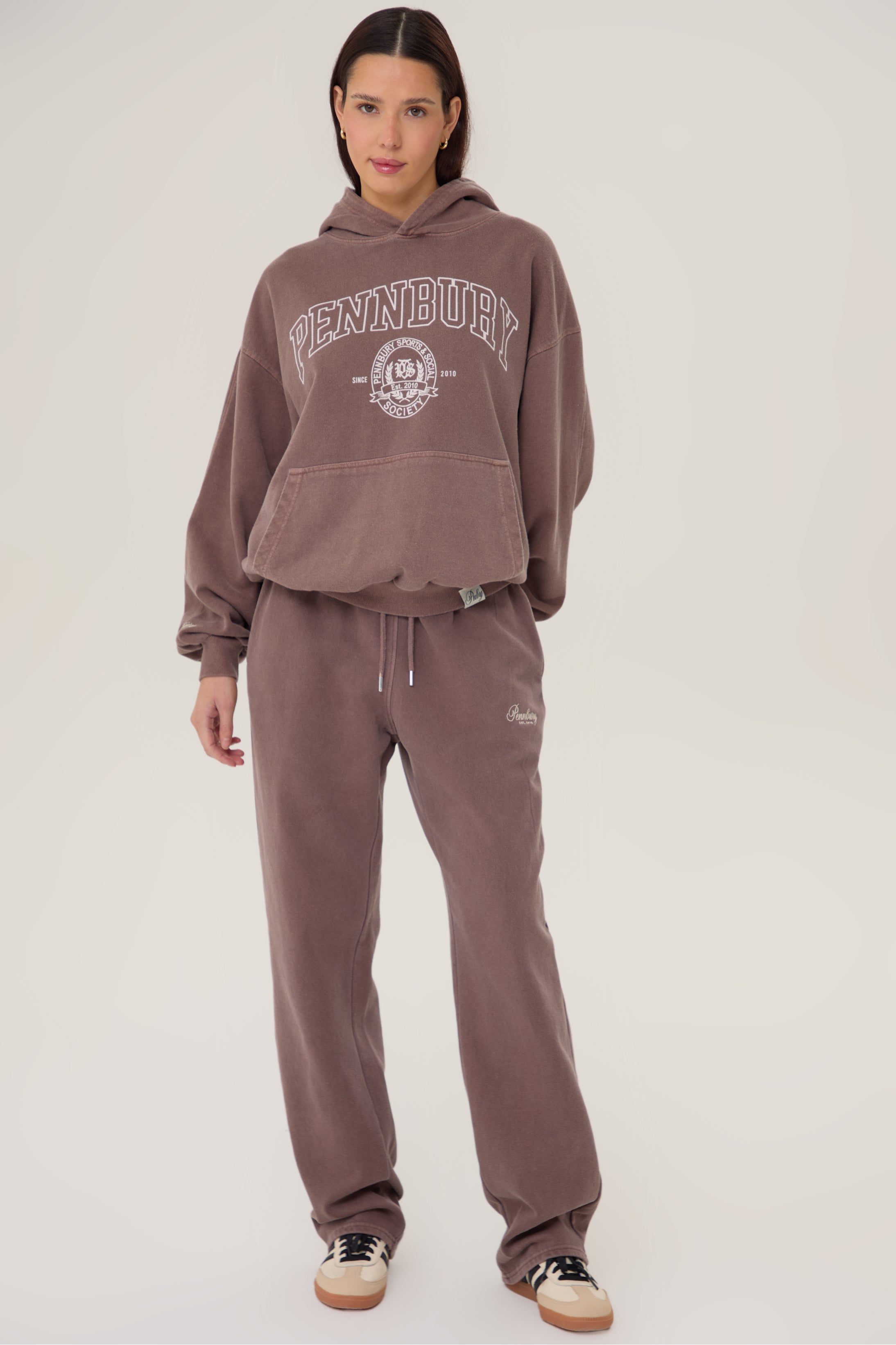 Model wearing Pennbury Grove oversized mocha hoodie with joggers