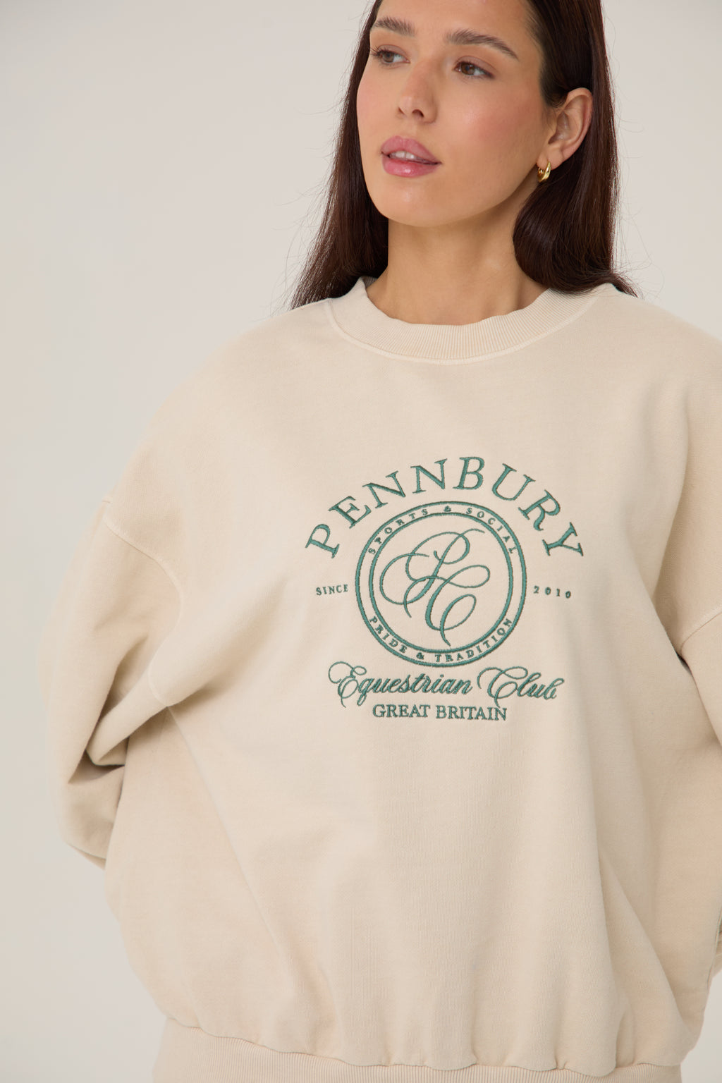 Model wearing Pennbury Pavilion oversized oat sweatshirt