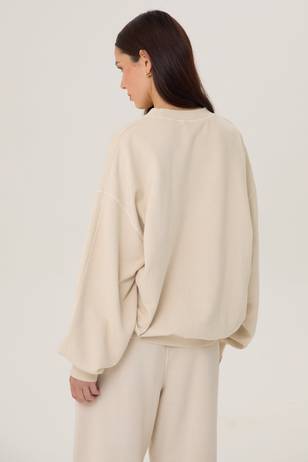 Model wearing Pennbury Pavilion oversized oat sweatshirt