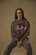 Model wearing Pennbury Prestige mocha oversized sweatshirt