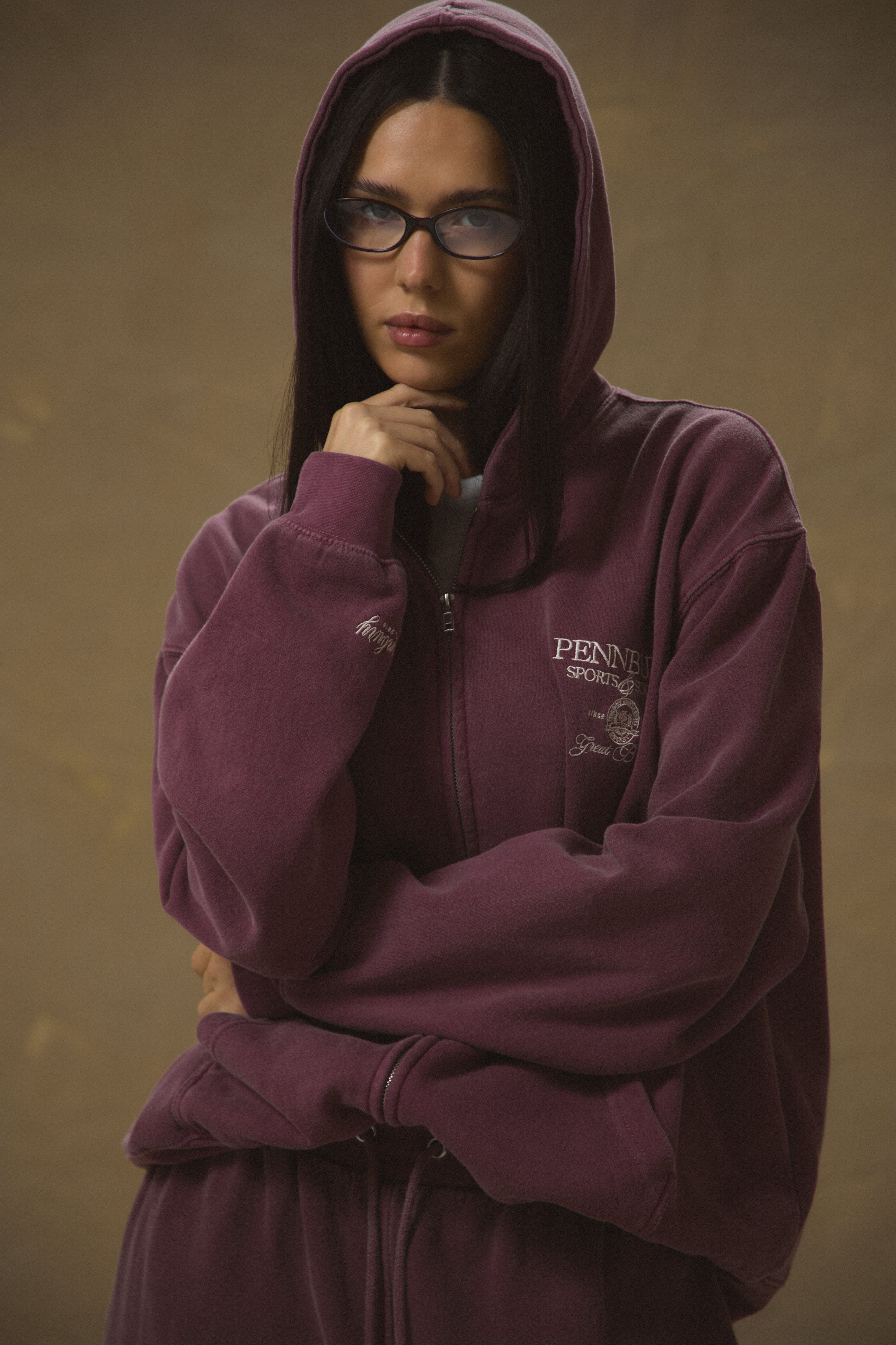 Model wearing Pennbury Regency oversized zip hoodie in vintage wine with joggers