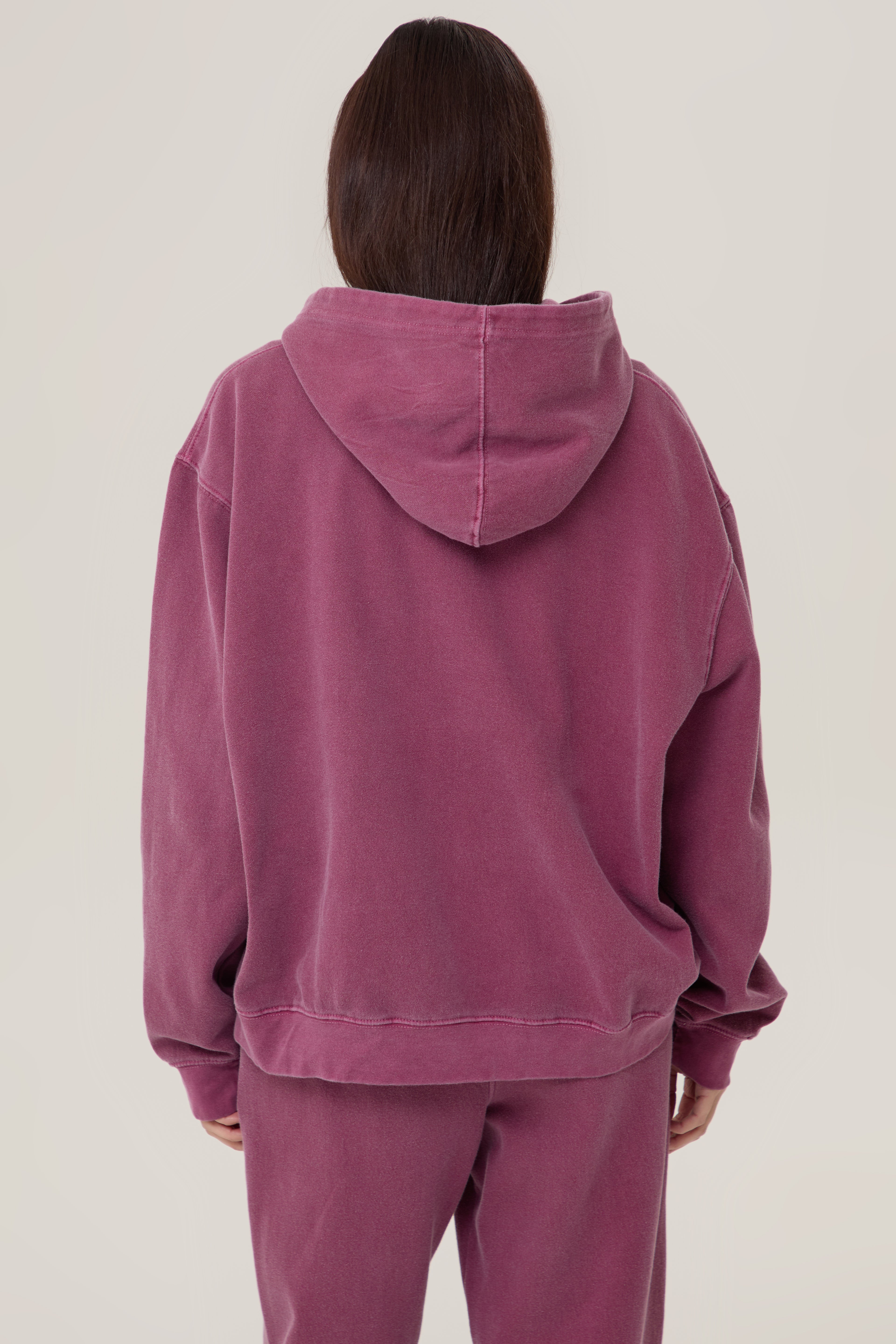 Model wearing Pennbury Regency oversized zip hoodie in vintage wine with joggers