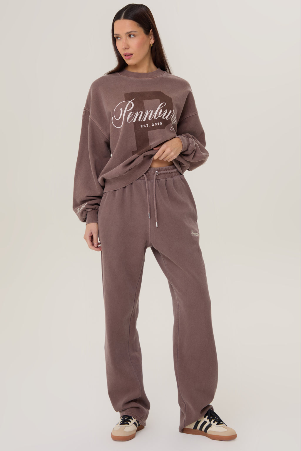 Model wearing Pennbury mocha straight leg joggers