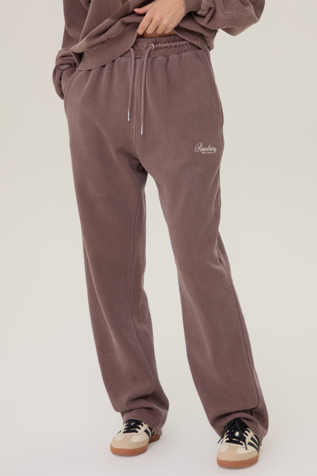 Model wearing Pennbury mocha straight leg joggers
