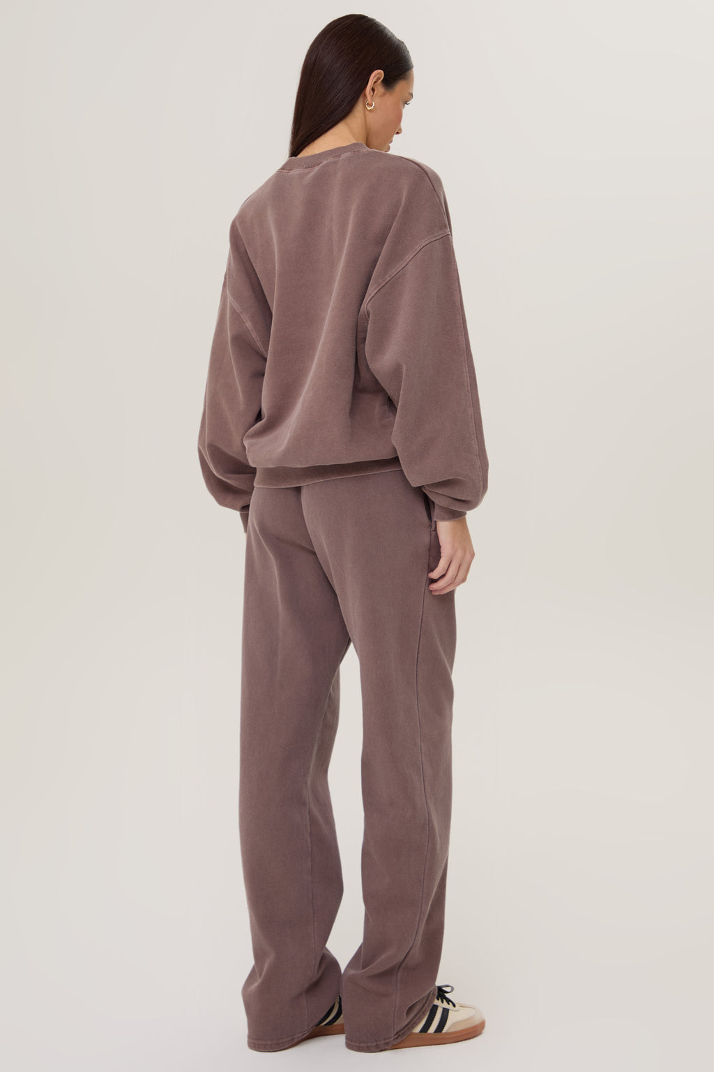 Model wearing Pennbury mocha straight leg joggers