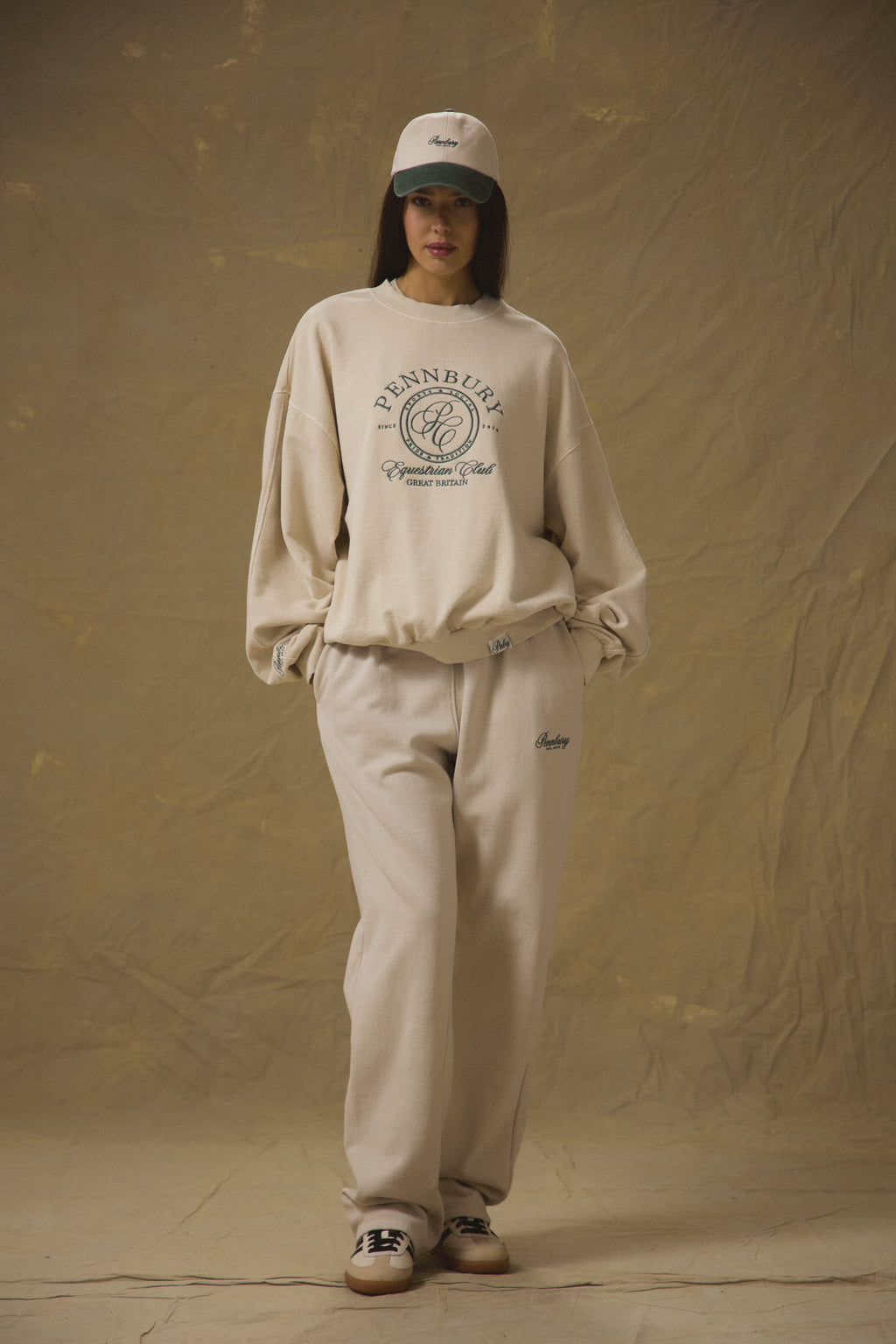 Model wearing Pennbury oat straight leg joggers
