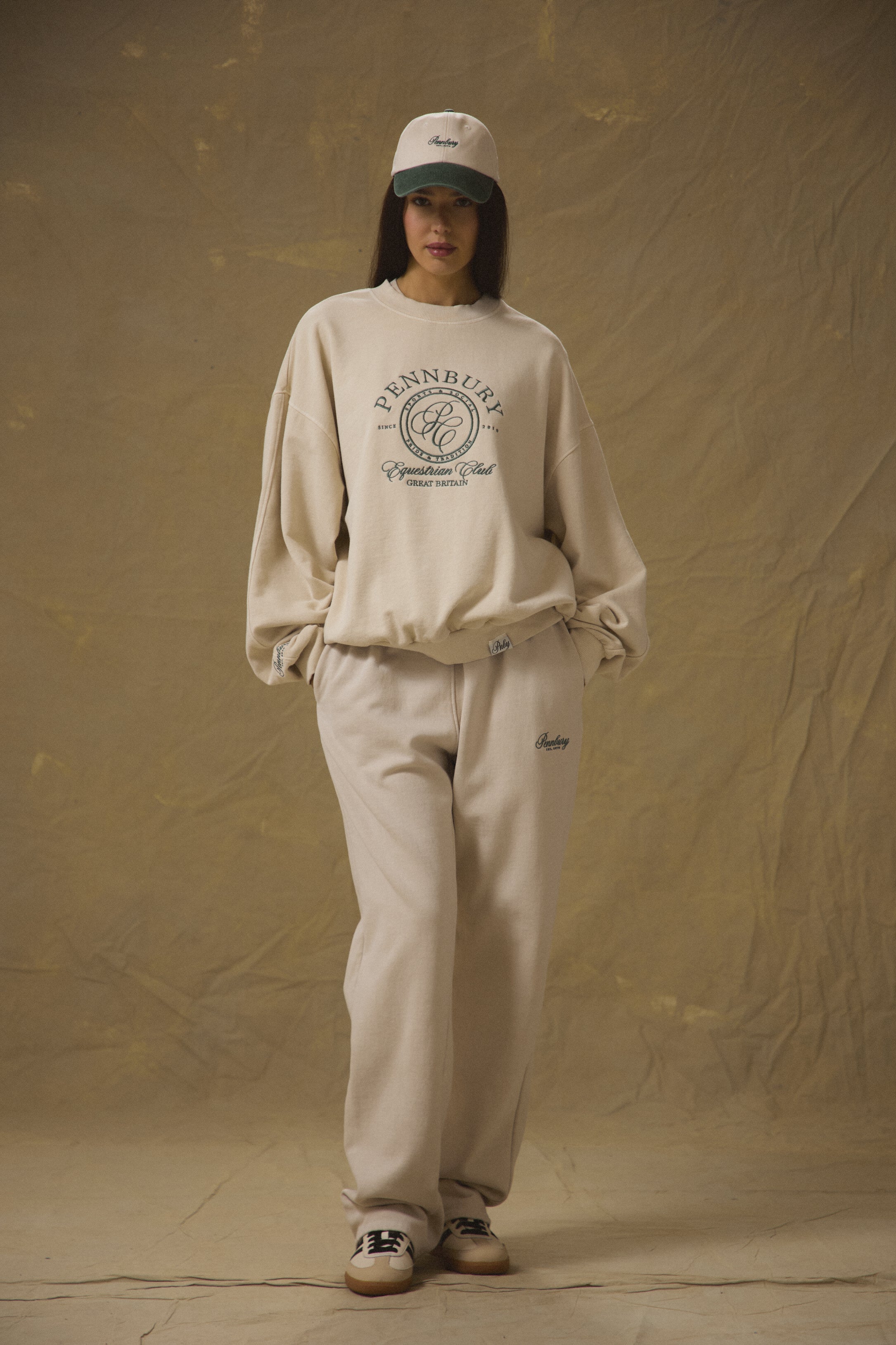 Model wearing Pennbury oat straight leg joggers