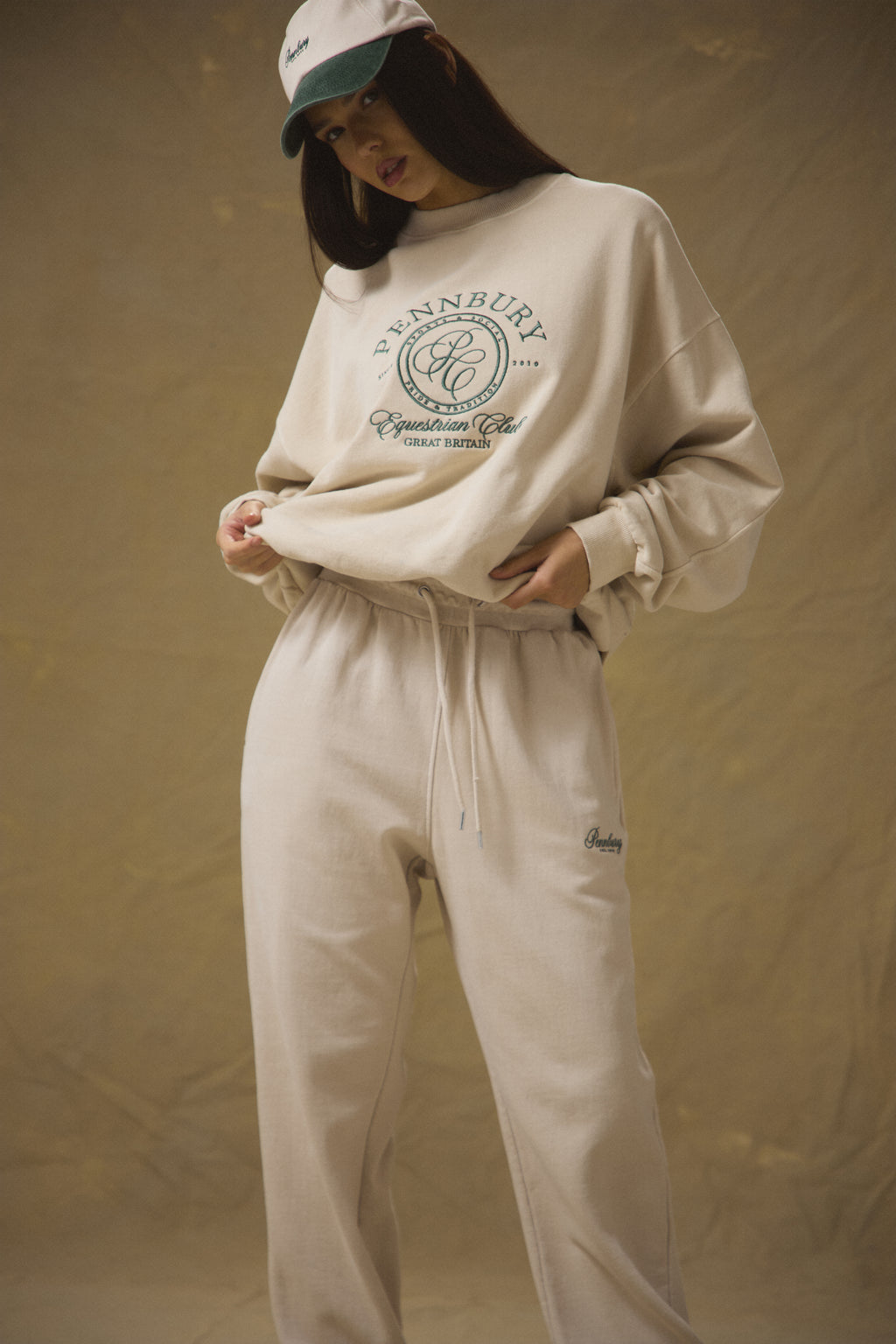 Model wearing Pennbury oat straight leg joggers