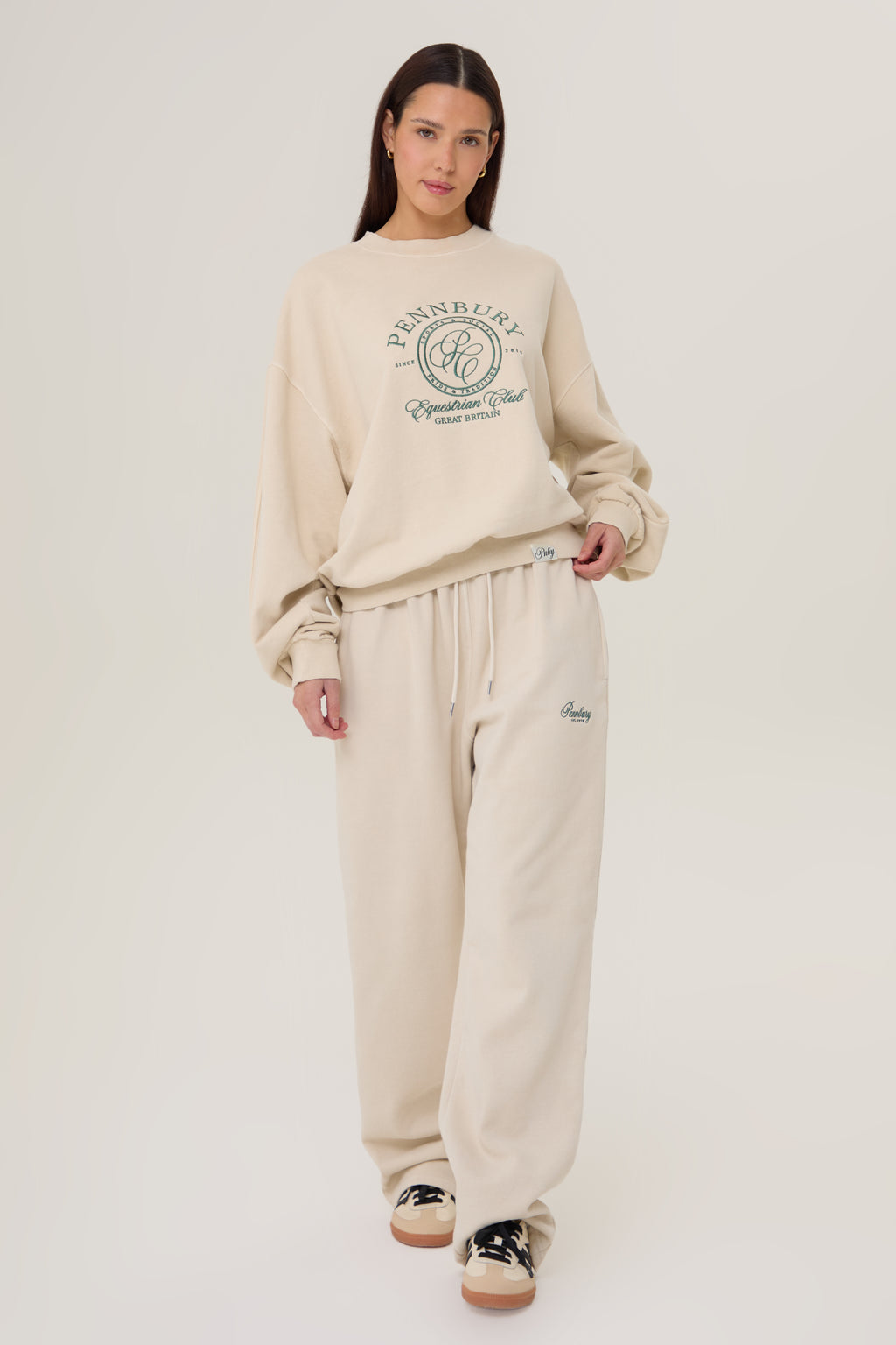 Model wearing Pennbury oat straight leg joggers