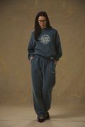  Model wearing Pennbury vintage navy straight leg joggers