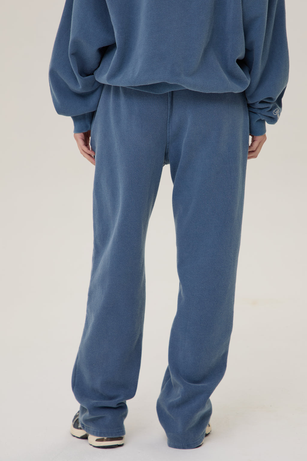  Model wearing Pennbury vintage navy straight leg joggers 
