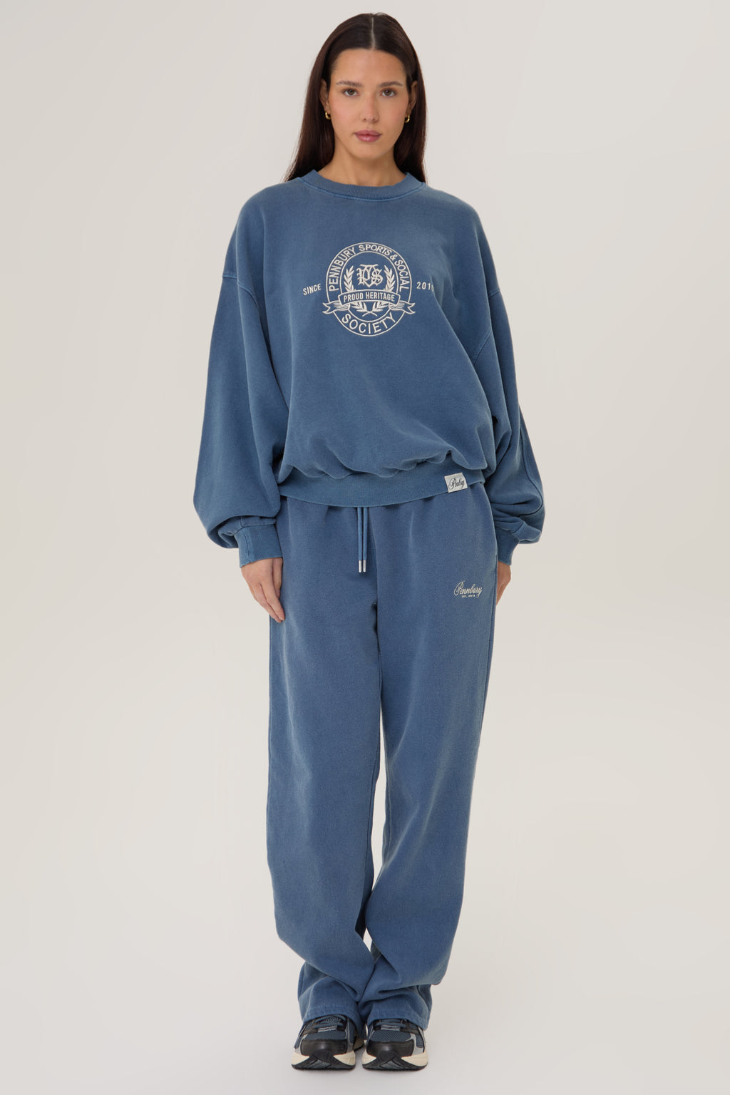 Model wearing Pennbury vintage navy straight leg joggers 