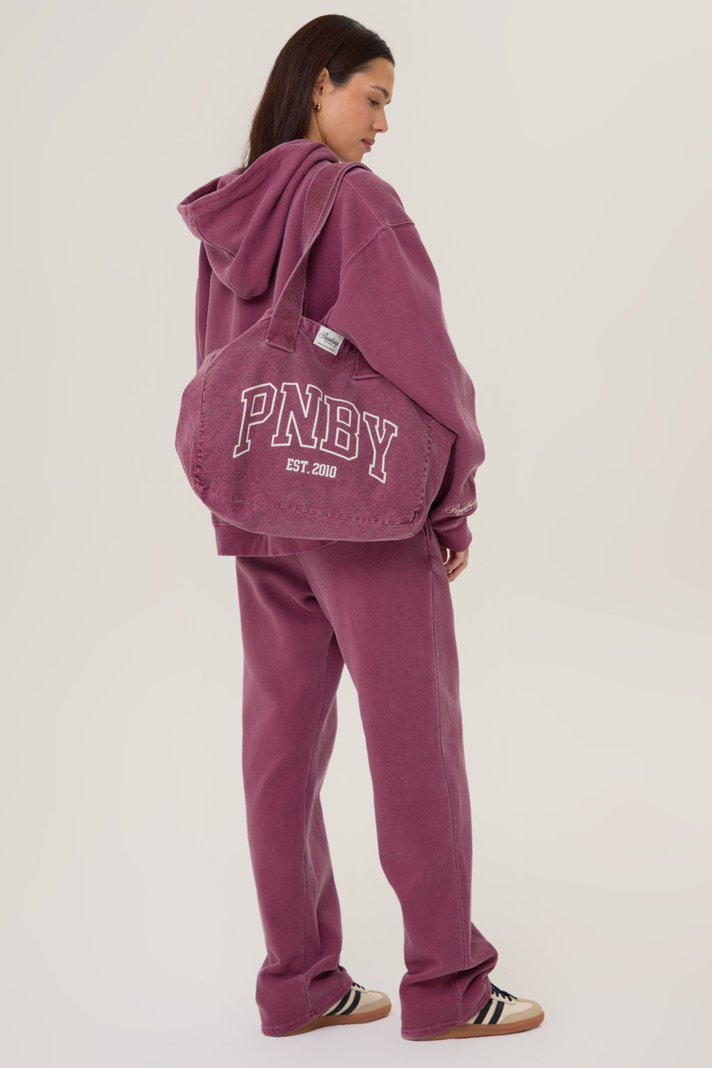 Model wearing Pennbury vintage wine straight leg joggers