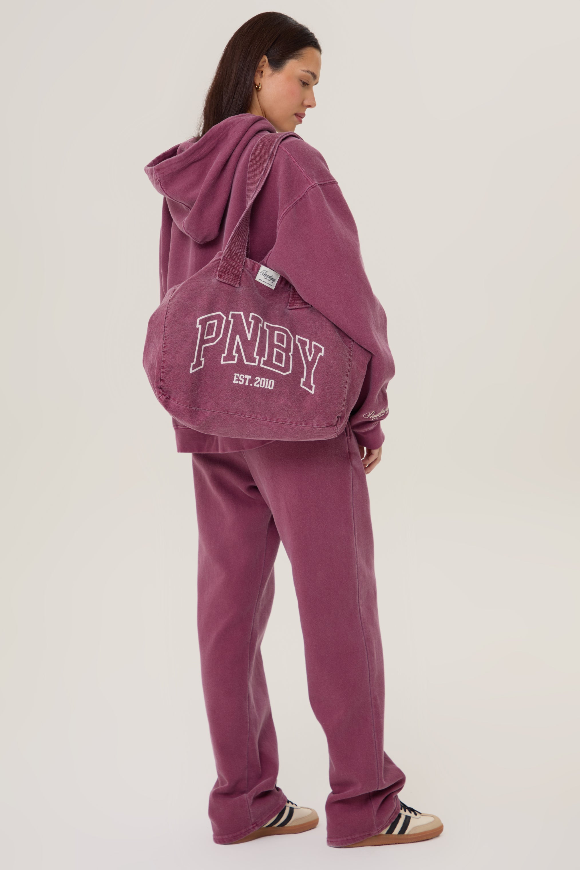 Model wearing Pennbury vintage wine straight leg joggers